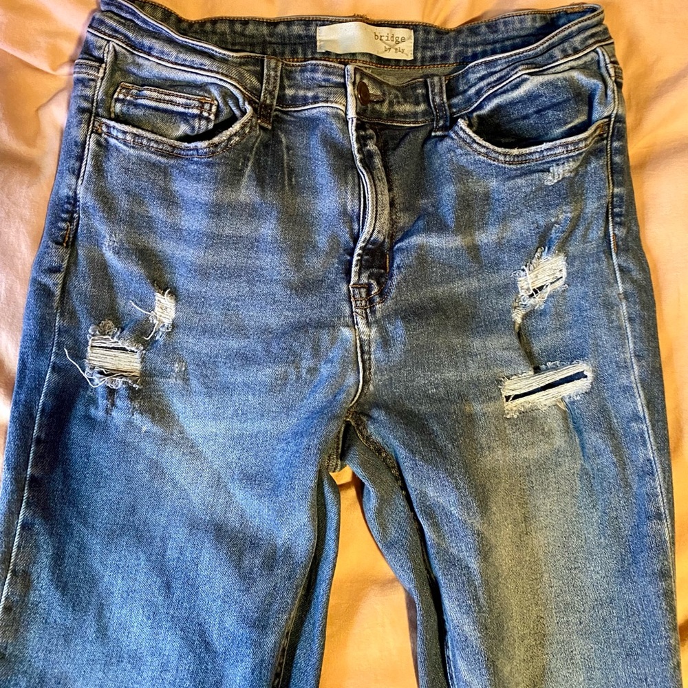Buckle, Bridge by Gly mid rise flare stretch distressed jeans, size 31
